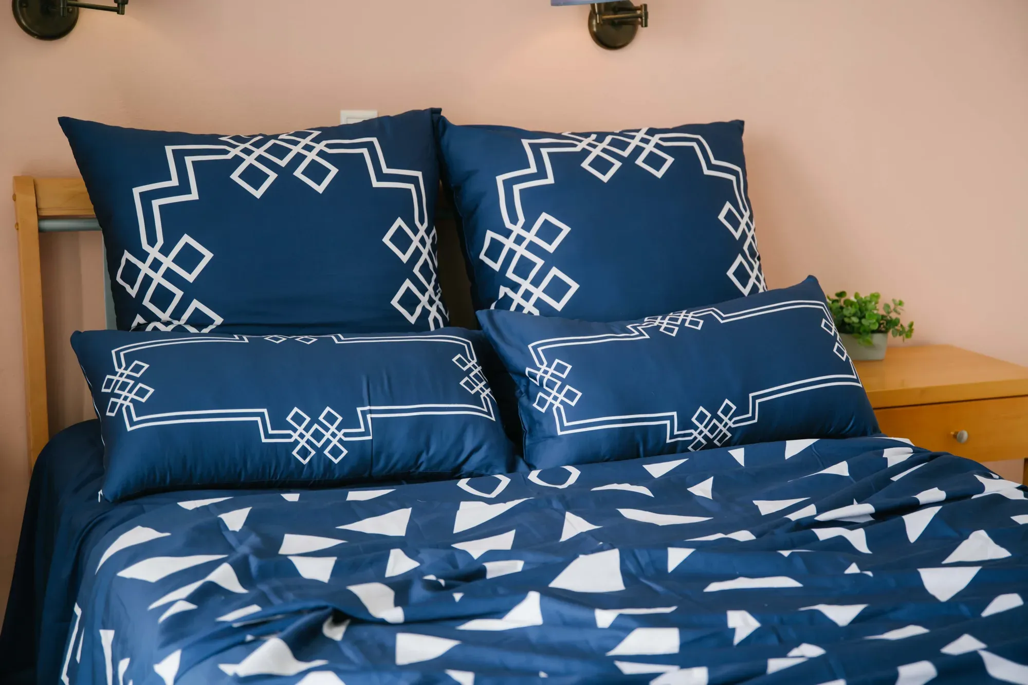 Mythos Tides pillowcases with the white medallion