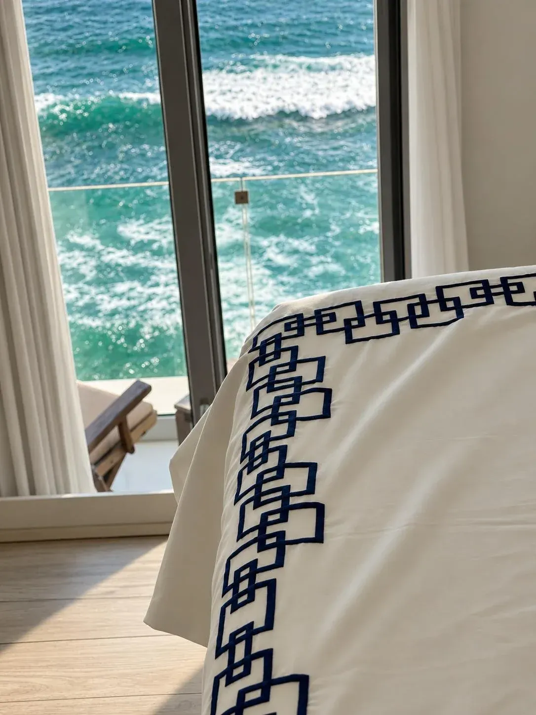A bed made in Desmos, the navy border running along the foot