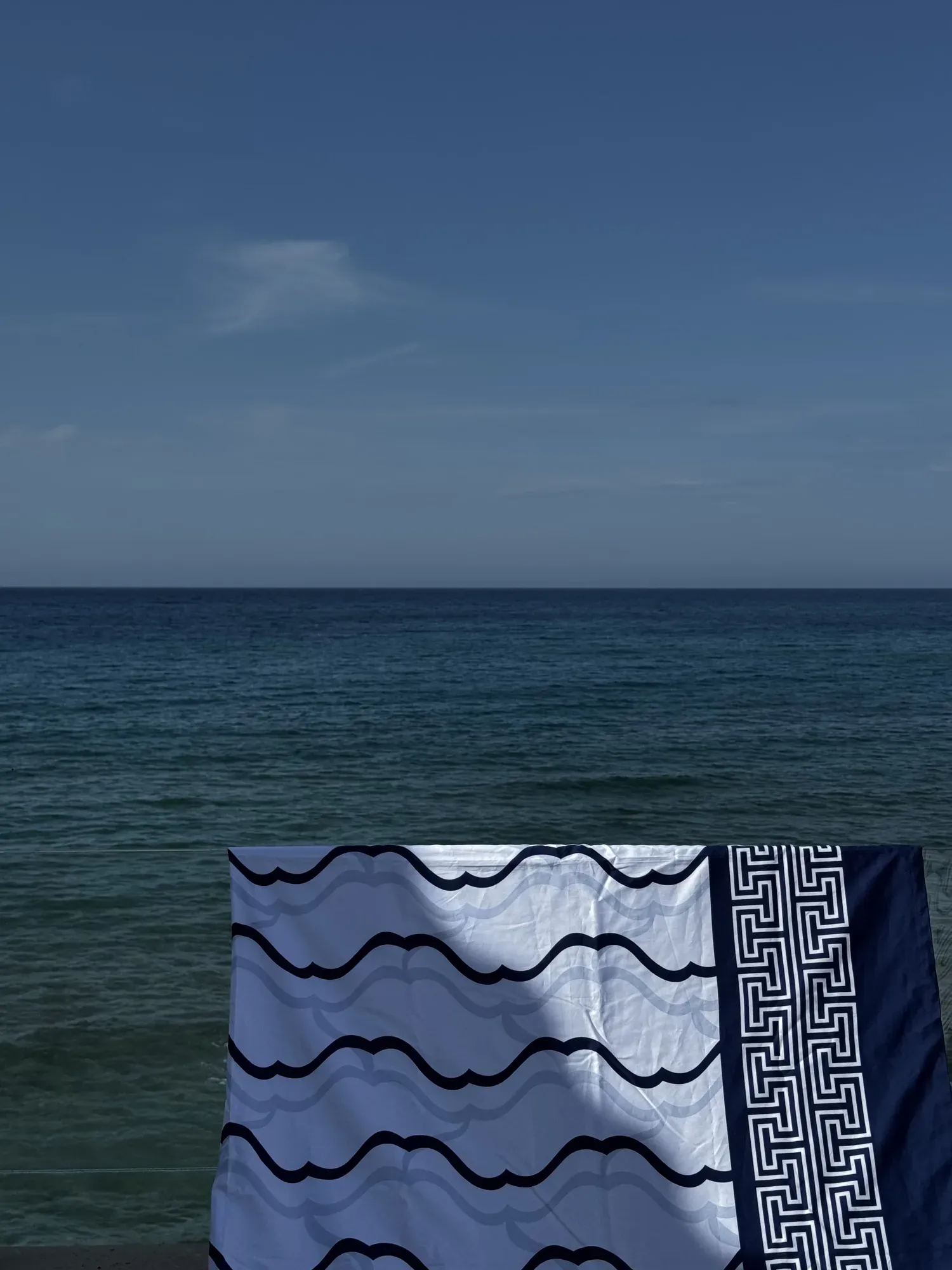 A bed made with Cycladic Serenity in full