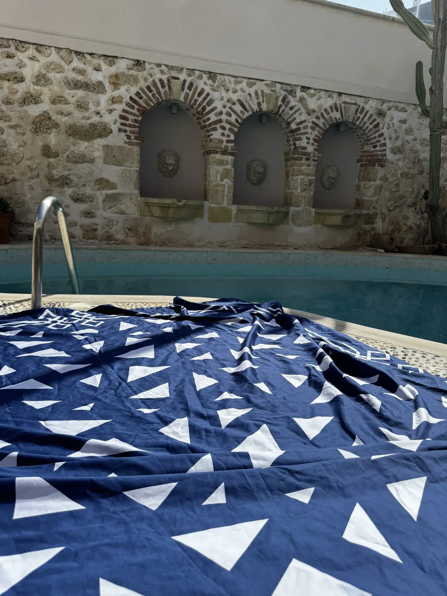 A hotel bed made in Mythos Tides