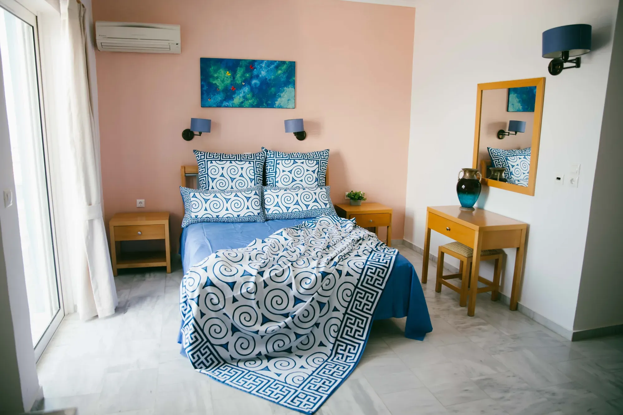 Aegean Whispers pillowcases and duvet on a made bed